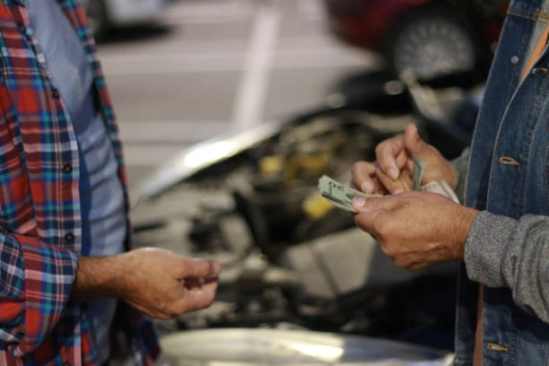 Tow truck removing a junk car in Hammond Indiana